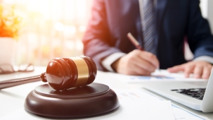 Wooden gavel on table. Attorney working in courtroom. law attorney court judge justice gavel legal legislation concept